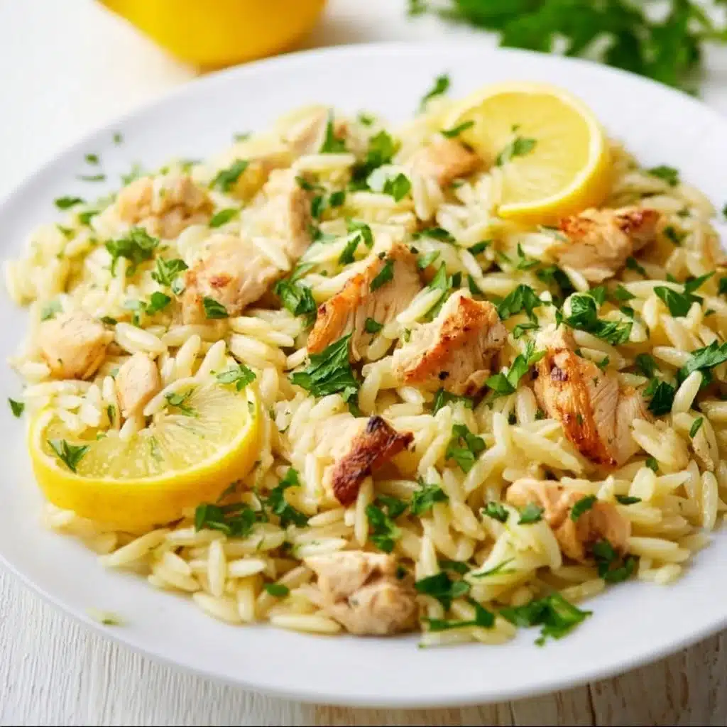Creamy lemon chicken orzo recipe with fresh herbs and lemon zest
