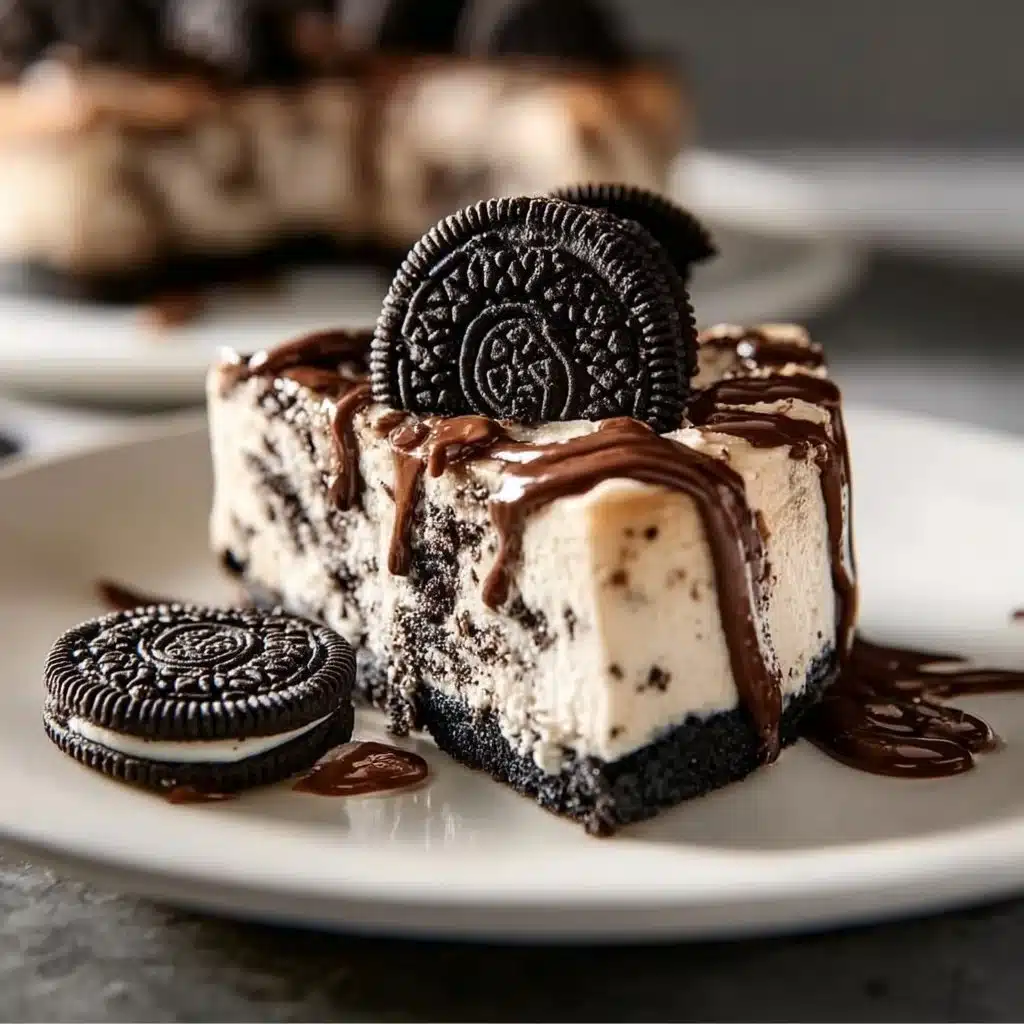 Deliciously topped Oreo Cheesecake with cookie crumbles and whipped cream