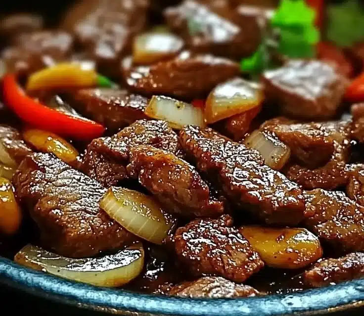 Sizzling Chinese Pepper Steak with Onions: A Flavor Sensation